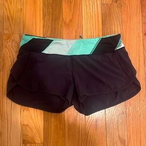 Lululemon: Lined Running Shorts in Black/Teal with Zipper Pocket; Size: 8